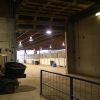 Roll up door leading to horse stalls
