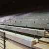 Most seats in the arena have wooden backs for our guests' comfort
